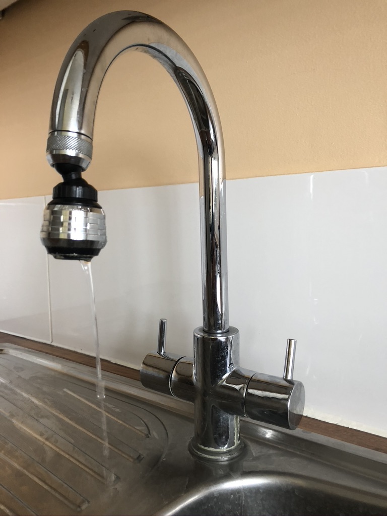 Kitchen Tap with constant running water.jpeg
